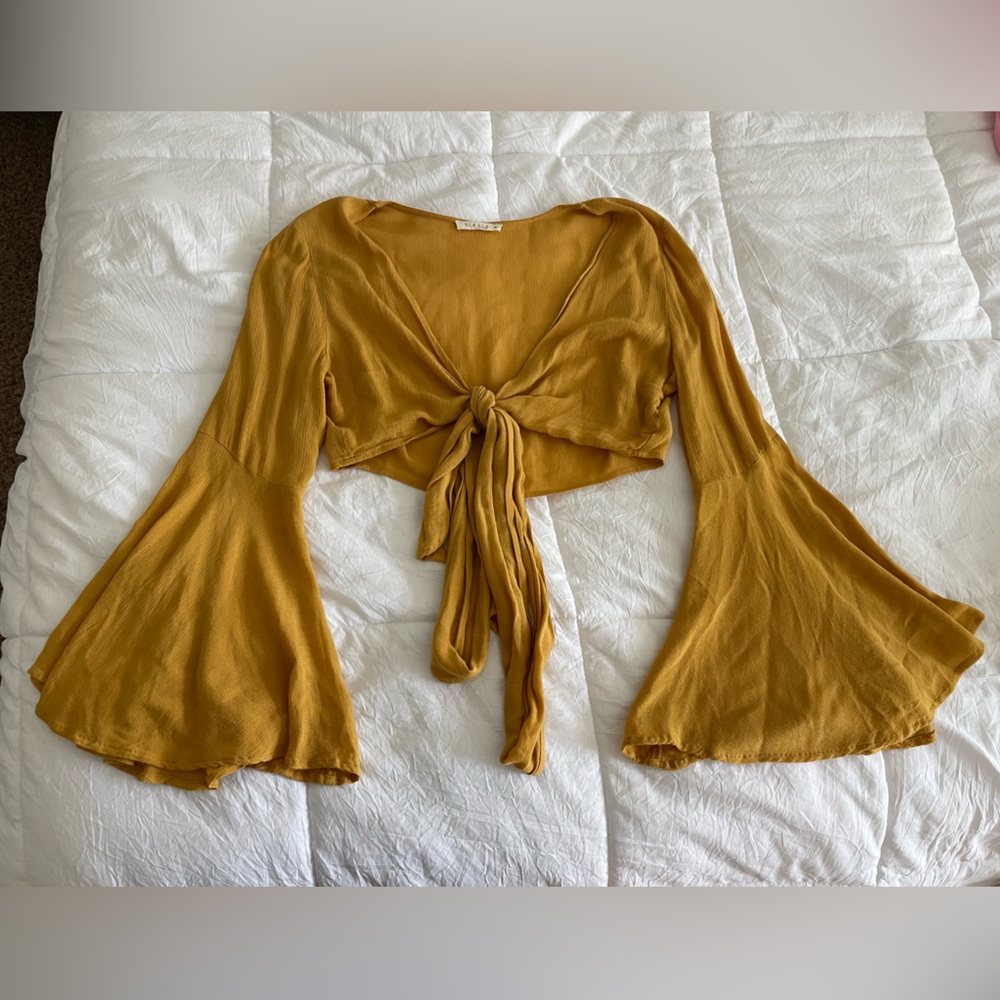 70’s Mustard Yellow long sleeved tie up crop top. Flared sleeves